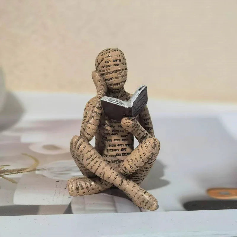 Newspaper Reader Sculpture - image 1